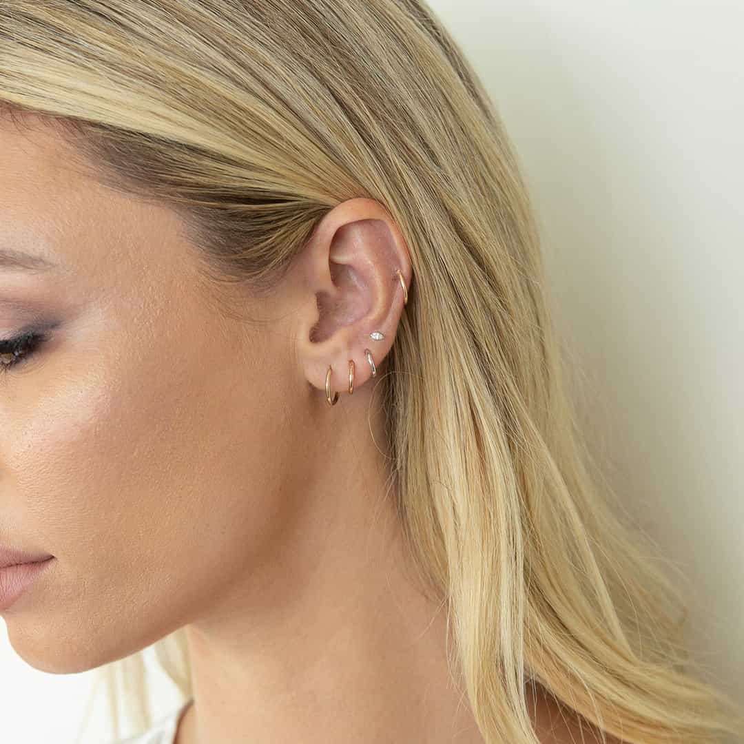 Grand Solid Huggie Hoop Earrings - Image 5